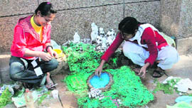 Students take part in a competition during the Display Your Talent event at Jammu University on Wednesday