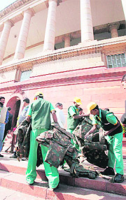 Bulletproof jackets are brought to Parliament as part of security measures in New Delhi on Wednesday.