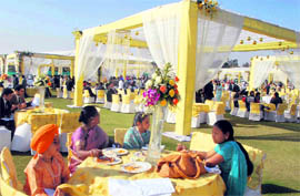 Sukhbirs son enjoys a hearty meal at the reception