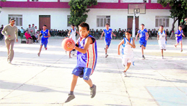 A match of the Council School Junior Basketball Tournament in progress at Dehradun on Thursday.