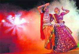 Artistes from Sri Ram Bhartiya Kala Kendra, New Delhi, give a performance during the ongoing Geeta Jayanti Utsav in Kurukshetra.