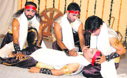 Artistes of the Sargam Theatrical Group stage Andhayug at Panchayat Bhawan in Jhajjar.