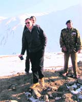 Chief Minister Omar Abdullah takes a walk on the Mughal Road during a historic drive from Dubjanto Peer Ki Gali-Bafliaz on Thursday. 
