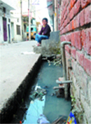 Drinking water supply pipes pass through the open drains in the Karampura locality of Ward No. 8 in Amritsar
