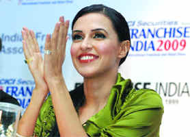 Actor and model Neha Dhupia during the launch of her Bollywood calendar 2010, in New Delhi on Friday.