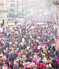 A heavy rush of shoppers on the eve of Id-ul-Azha at Lal Chowk in Srinagar on Friday.