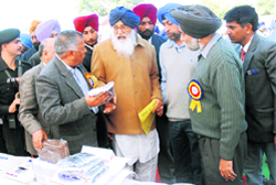 Chief Minister Parkash Singh Badal inspects a stall after inaugurating the first regional cattle fair of Guru Angad Dev Veterinary and Animal Sciences University at Kaljharani village, Bathinda