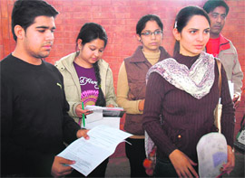 Students who could not take the exam due to log-in problems at Gian Jyoti Institute, Mohali, on Saturday.