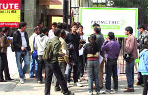 Students outside a CAT 2009 entrance test centre at Janakpuri in New Delhi on Saturday.