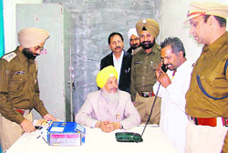Minister for Jails Hira Singh Gabria inaugurates telephone service at Central Jail in Ludhiana on Saturday.