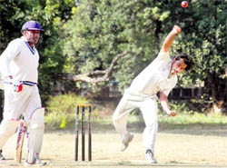 A bowler in action at the Beehive Challenger Trophy Twenty-20 Inter-District Cricket Tournament in Dehradun on Sunday