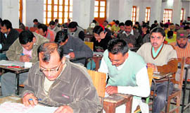 Students take research entrance test at Gurukul Kangri University in Haridwar on Sunday