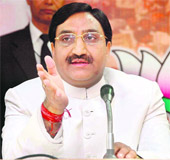 Chief Minister Ramesh Pokhriyal Nishank addresses a press conference in Dehradun on Sunday. 