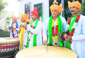 Folk artistes from Haryana perform at the Trade Fair in New Delhi. 