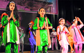 Students give a performance during the annual day function of St Stephens International Public School in Jammu on Sunday
