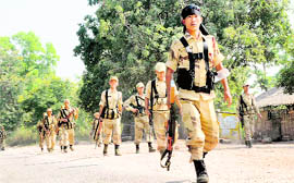 Jawans of Naga battalion patrol on the first day of the 48-hour bandh called by CPI (Maoist) near Ranchi on Sunday.