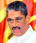 Former chief of the Sri Lankan army Gen Sarath Fonseka looks on during a media briefing in Colombo on Sunday