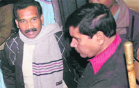Former Jharkhand Chief Minister Madhu Koda being taken away after he was arrested by the state Vigilance Bureau in Chaibasa, 200 km from Ranchi,