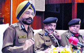 Himmat Singh, BSF Inspector General, Punjab Frontier, addresses mediapersons at the BSF Headquarters in Jalandhar on Monday.