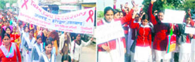A rally being taken out by the Health Department in Haridwar; and (right) students of Girls College at Jagjitpur village spread awareness about AIDS on Tuesday