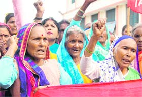 Women tea workers protest in front of the office of the Labour Commissioner in Dehradun