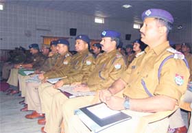 Policemen attend a conference in Dehradun