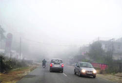 Winter brings with it fog.  Hence in such conditions, one has to switch on lights to drive safely.  The picture shows vehicles with lights on between Mandi and Sundernagar.