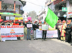 Education Minister ID Dhiman flagging off a rally on the World AIDS Day at Hamirpur on Tuesday.
