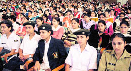 Students attend a seminar on World Aids Day at Government College for Women, Gandhi Nagar, Jammu, on Tuesday