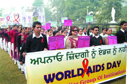 Students of the St Soldier Group of Institutions take out an awareness rally on the occasion of World AIDS Day in Jalandhar on Tuesday.