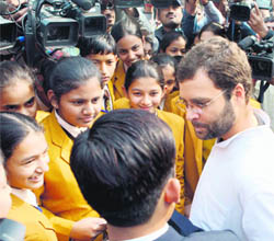 Congress general secretary Rahul Gandhi interacts with students of Heritage School in Sangrur, who visited Parliament in New Delhi on Tuesday.