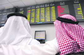 Bahraini traders follow the markets movement at the stock exchange in Manama on Wednesday. Gulf stock markets steadied after heavy losses over the previous two days following Dubais debt crisis.