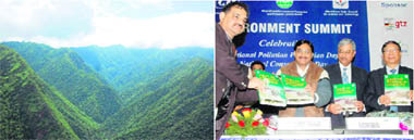 A file photo of Uttarakhand forests; and (right) Chief Minister Ramesh Pokhriyal Nishank releases a souvenir at the Environment Summit in Dehradun on Wednesday.