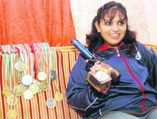 Dilraj Kaur with her medals.