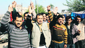 Members of the All-Jammu and Kashmir Unemployed ITI Electrical Diploma Holders Association protest in support of their demands in Jammu on Wednesday.