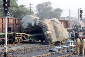 Army tanks fallen from a goods train that was hit by a wagon during a shunting exercise at the Bathinda railway yard