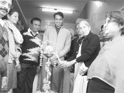 Health Minister Laxmi Kanta Chawla inaugurates a generic drug store at Ropar.