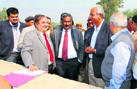 NPCIL chief Dr K Jain at the site of the proposed nuclear power plant at Kumharia in Fatehabad district on Thursday along with senior Haryana officers.