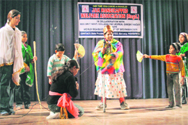 Artistes give a performance during a function organised by the J&K Handicapped Welfare Association at Government Womens College, Gandhi Nagar, Jammu,