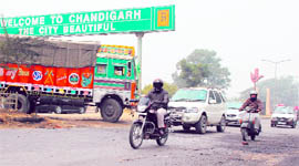 Posing a grave danger to road users on the Chandigarh-Ambala National Highway, trucks continue to take wrong turn near the Zirakpur sales tax barrier