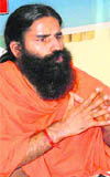 Swami Ramdev speaks against multinational companies in Haridwar.