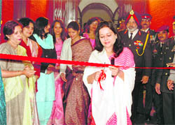   Rashmi Sujlana, wife of Lt Gen RS Sujlana, Commandant, IMA inaugurats the indoor club exhibition-cum-competition at the IMA in Dehradun on Friday.