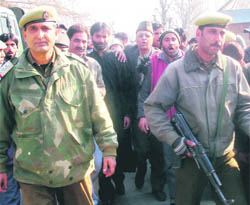 Jammu and Kashmir Liberation Front chairman Yasin Malik being arrested along with his supporters at Handwara in Kupwara where he had gone to address a public rally on Friday.