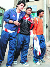 Injured players of Gurukul Kangri Vishvidyalaya, Haridwar, come out of the GMCH after getting first aid in Jammu on Friday.