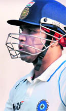 Virender Sehwag walks back after being dismissed.  AFP