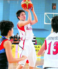 Japenese captain Rina Hill takes a shot against Korea on Friday. Tribune photo: Pradeep Tewari