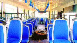 The inside view of a luxury city bus
