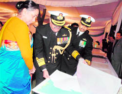 Uttarakhand Governor Margaret Alva being shown hydrographic maps by Chief Hydrographer of the government of India Vice-Admiral VR Rao at the Naval Week celebrations in Dehradun on Friday