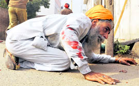 Darshan Singh (58) minutes before he succumbed to bullet injuries received during police firing in Ludhiana on Saturday.
