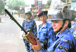 Personnel from the women wing of the Rapid Action Force deployed to avoid any untoward incident ahead of the 17th anniversary of the Babri Masjid demolition, in Faizabad